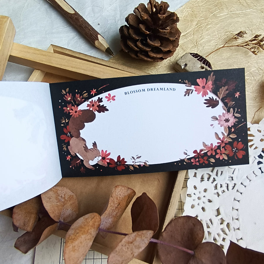 Wwiinngg notepad - celebration of petals