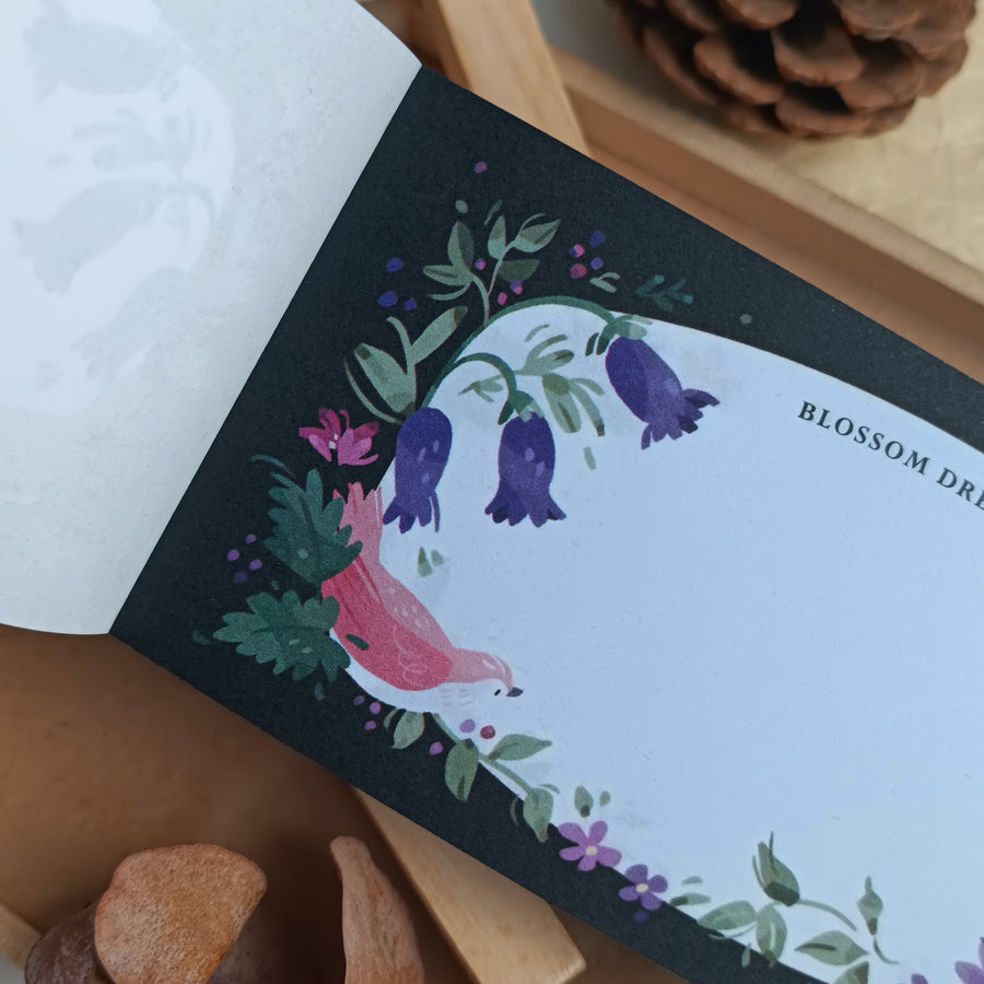 Wwiinngg notepad - celebration of petals