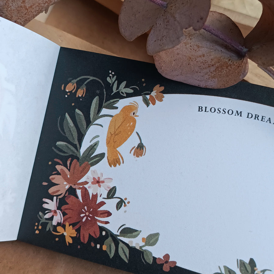 Wwiinngg notepad - celebration of petals