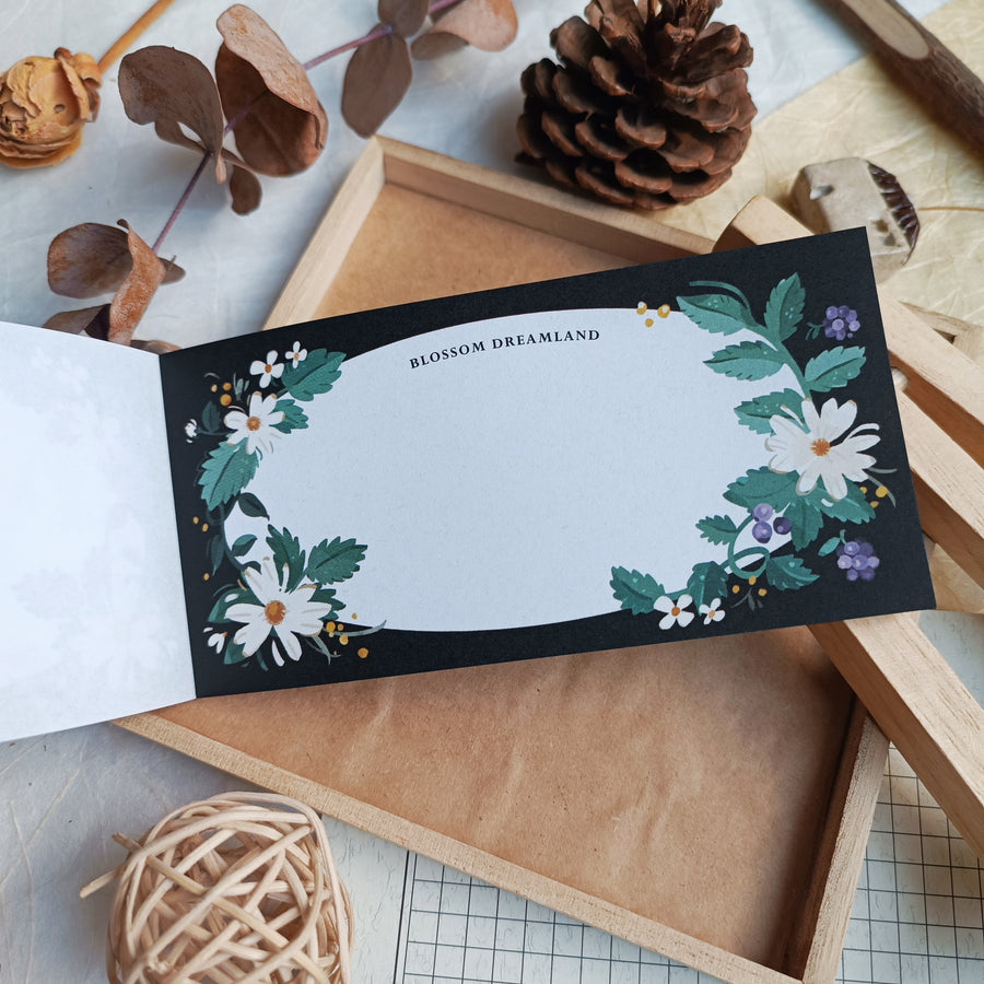 Wwiinngg notepad - celebration of petals