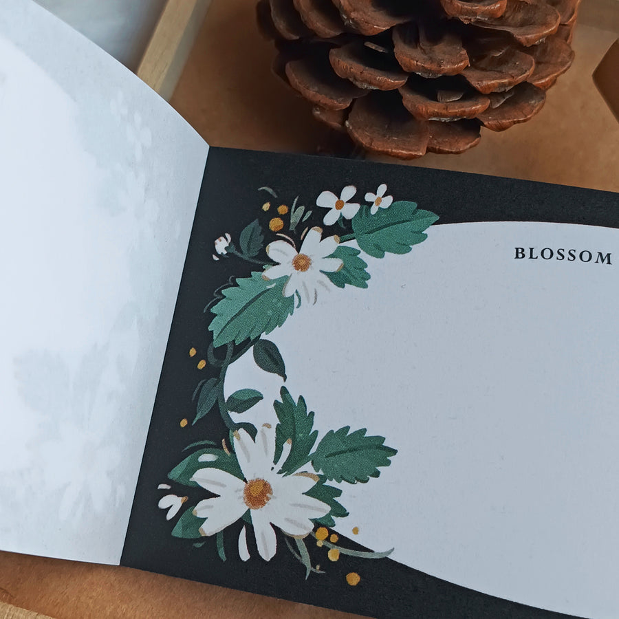 Wwiinngg notepad - celebration of petals