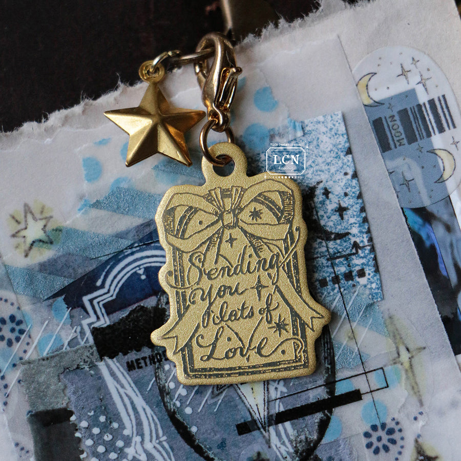 LCN brass charm
